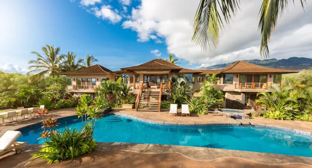 Luxury Maui property with pool and ocean views representing Maui real estate market trends statistics and analysis for buyers